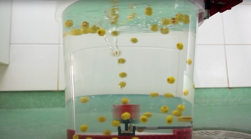 How do LEGO bricks react with a water vortex?